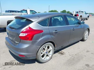 2014 Ford Focus Titanium with VIN 1FADP3N22EL317007, listed as a IAAI auction lot 42641134 with 159,705 mi miles and . Bid and sale history available at DreamBid. Image 4.