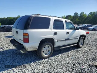 2000 Chevrolet Tahoe LS with VIN 1GNEK13T2YJ203352, listed as a Copart auction lot 58077765 with 314,293 mi miles and Salvage title. Bid and sale history available at DreamBid. Image 3.