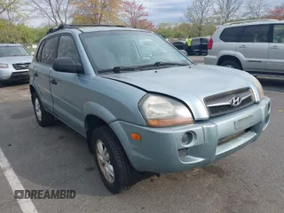 2009 Hyundai Tucson GLS with VIN KM8JM12B79U991776, listed as a IAAI auction lot 42088648 with 219,207 mi miles. Bid and sale history available at carsss.com. Image 1.