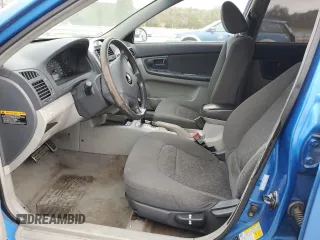 2006 Kia Spectra with VIN KNAFE162X65259727, listed as a Copart auction lot 75470994 with 0 mi miles and Salvage Title. Bid and sale history available at carsss.com. Image 7.