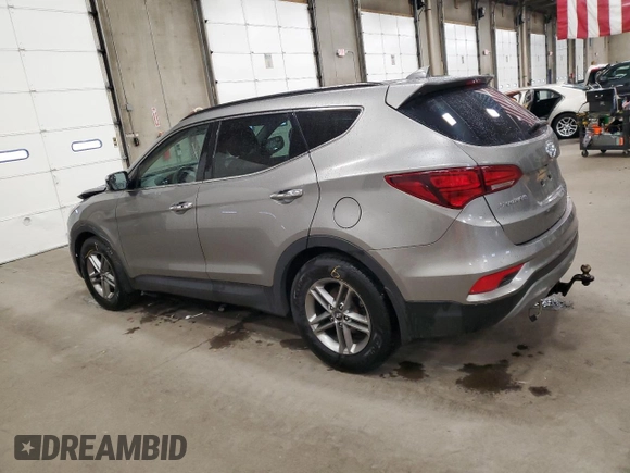2018 Hyundai Santa Fe 2.4L with VIN 5NMZUDLB5JH096340, listed as a Copart auction lot 61038095 with 114,993 mi miles and Salvage title. Bid and sale history available at DreamBid. Image 2.