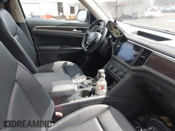 2019 Volkswagen Atlas SE z VIN 1V2UR2CA6KC580992, wystawiony jako IAAI lot #41902265 z przebiegiem 63 233 mil mil oraz . Historia ofert i sprzedaży dostępna na DreamBid. Obrazek 5.