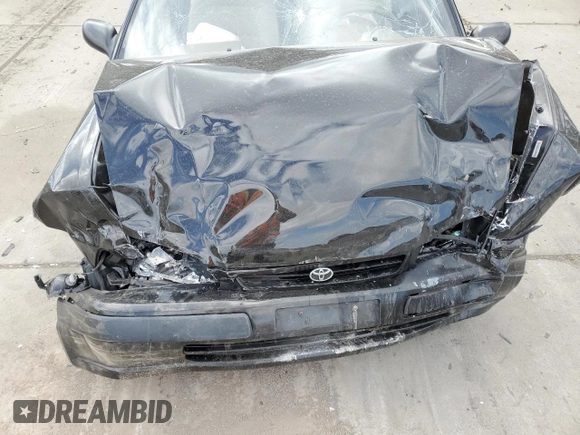1996 Toyota Tercel DX z VIN JT2AC52LXT0157984, wystawiony jako Copart lot #76524974 z przebiegiem Nie podano mil oraz Szkoda całkowita • Salvage title. Historia ofert i sprzedaży dostępna na DreamBid. Obrazek 12.