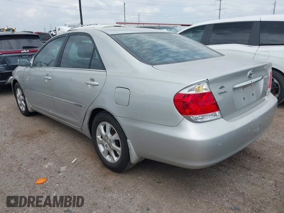 2006 Toyota Camry LE z VIN 4T1BF32K86U119208, wystawiony jako IAAI lot #42127284 z przebiegiem 99 864 mil mil oraz . Historia ofert i sprzedaży dostępna na DreamBid. Obrazek 3.