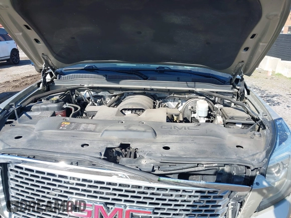 2016 GMC Yukon Denali with VIN 1GKS2CKJ5GR393269, listed as a IAAI auction lot 41963630 with 158,584 mi miles and . Bid and sale history available at DreamBid. Image 10.