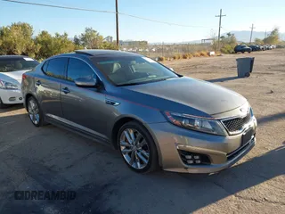 2014 Kia Optima SXL Turbo with VIN 5XXGR4A60EG351334, listed as a IAAI auction lot 41513606 with 174,382 mi miles and . Bid and sale history available at DreamBid. Image 1.