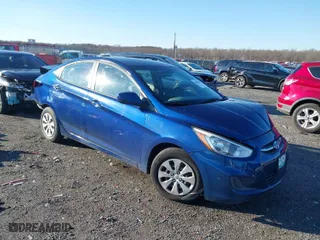 2015 Hyundai Accent GLS with VIN KMHCT4AE6FU916149, listed as a IAAI auction lot 41082268 with 153,219 mi miles. Bid and sale history available at carsss.com. Image 1.