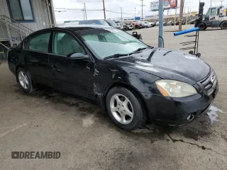 2004 Nissan Altima with VIN 1N4AL11D54C193517, listed as a Copart auction lot 56189985 with 210,451 mi miles and Salvage title. Bid and sale history available at DreamBid. Image 4.