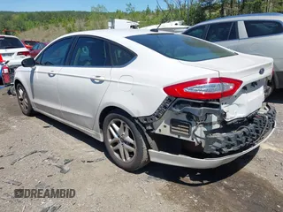 2014 Ford Fusion SE with VIN 1FA6P0H74E5384033, listed as a IAAI auction lot 41973706 with 187,988 mi miles. Bid and sale history available at carsss.com. Image 3.