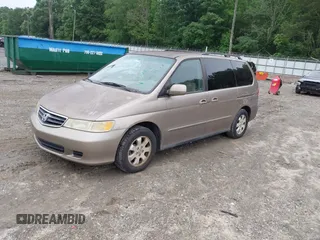 2004 Honda Odyssey EX-L z VIN 5FNRL189X4B036406, wystawiony jako IAAI lot #42368037 z przebiegiem 177 513 mil mil oraz . Historia ofert i sprzedaży dostępna na DreamBid. Obrazek 2.