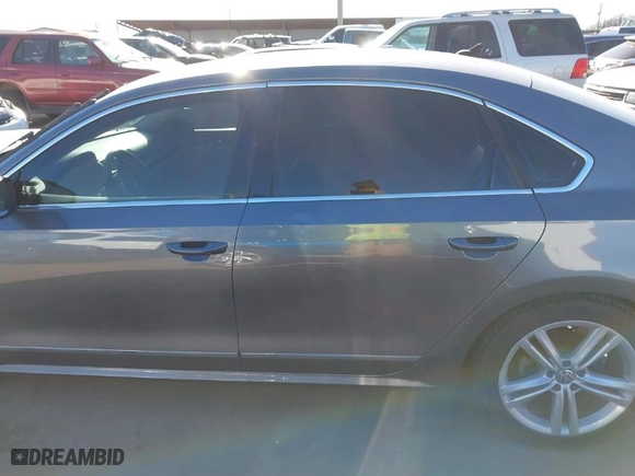 2015 Volkswagen Passat 2.0L TDI SEL Premium with VIN 1VWCV7A34FC034494, listed as a IAAI auction lot 41254799 with 102,881 mi miles. Bid and sale history available at carsss.com. Image 15.