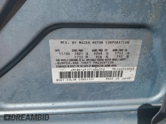 2007 Mazda 3 i Touring with VIN JM1BK12F371666350, listed as a Copart auction lot 48012045 with 169,235 mi miles and Salvage Title. Bid and sale history available at DreamBid. Image 14.