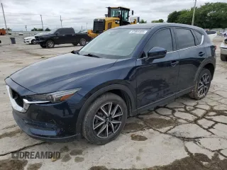 2018 Mazda CX-5 Grand Touring with VIN JM3KFBDM1J0368454, listed as a Copart auction lot 57083305 with 125,671 mi miles and Salvage title. Bid and sale history available at DreamBid. Image 1.