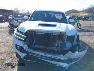 2023 Toyota Tacoma 4WD SR with VIN 3TMCZ5AN1PM538367, listed as a IAAI auction lot 41468684 with 28,879 mi miles. Bid and sale history available at carsss.com. Image 6.