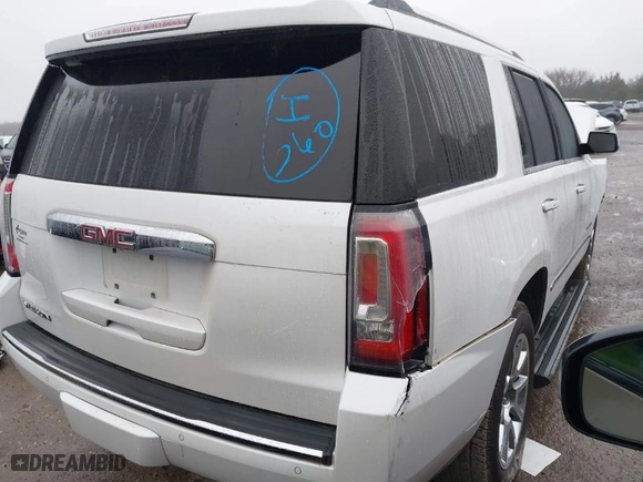 2016 GMC Yukon Denali with VIN 1GKS2CKJ1GR299065, listed as a IAAI auction lot 41513618 with 111,043 mi miles. Bid and sale history available at carsss.com. Image 4.