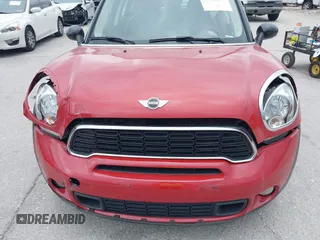 2013 MINI Countryman S z VIN WMWZC3C51DWP22150, wystawiony jako IAAI lot #41973886 z przebiegiem 28 947 mil mil oraz . Historia ofert i sprzedaży dostępna na DreamBid. Obrazek 12.