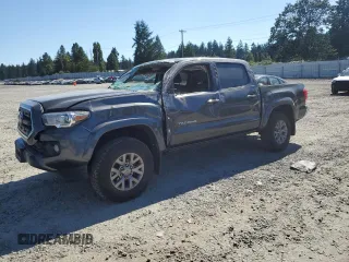 2017 Toyota Tacoma SR5 with VIN 3TMCZ5ANXHM052092, listed as a Copart auction lot 64898135 with 95,743 mi miles and Salvage title. Bid and sale history available at DreamBid. Image 1.