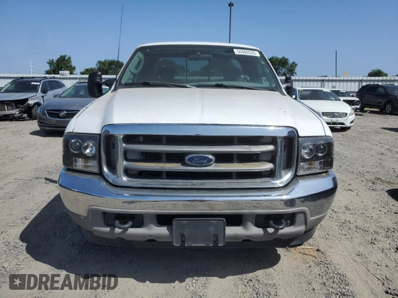 2003 Ford F-250 XL с VIN 1FTNX20L93EA98198, выставлен на аукционе Copart как лот 54366535 с пробегом 210 204 миль миль и Списание • Salvage title. История ставок и продаж доступна на DreamBid. Изображение 5.
