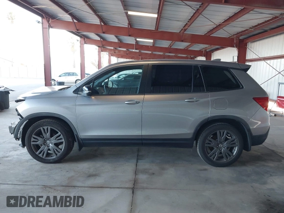 2019 Honda Passport EX-L with VIN 5FNYF7H58KB001928, listed as a IAAI auction lot 41862168 with 102,743 mi miles and . Bid and sale history available at carsss.com. Image 15.