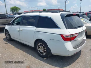 2012 Honda Odyssey EX-L with VIN 5FNRL5H63CB063684, listed as a IAAI auction lot 42576742 with 170,656 mi miles and . Bid and sale history available at DreamBid. Image 3.