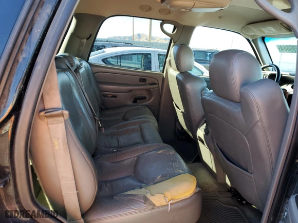 2004 GMC Yukon SLT with VIN 1GKEK13Z34R106142, listed as a Copart auction lot 77596684 with 209,198 mi miles and Clean Title. Bid and sale history available at carsss.com. Image 10.
