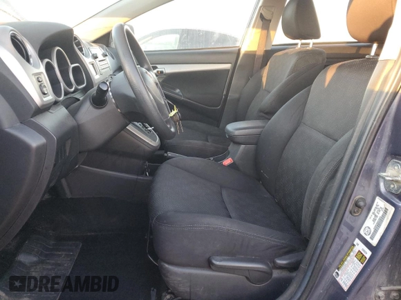 2009 Pontiac Vibe with VIN 5Y2SM67069Z446233, listed as a Copart auction lot 76932424 with 291,671 mi miles and Salvage Title. Bid and sale history available at carsss.com. Image 7.