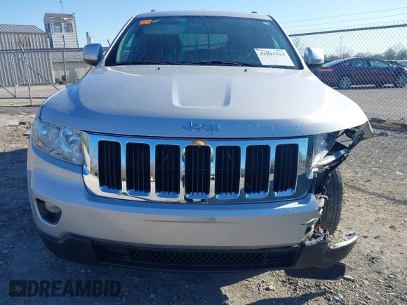 2013 Jeep Grand Cherokee Laredo with VIN 1C4RJFAG3DC586667, listed as a IAAI auction lot 42041524 with 100,635 mi miles. Bid and sale history available at carsss.com. Image 17.