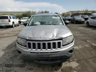 2016 Jeep Compass Sport with VIN 1C4NJCBA5GD612112, listed as a Copart auction lot 60039395 with 154,860 mi miles and Salvage title. Bid and sale history available at DreamBid. Image 14.