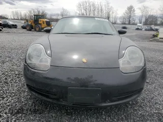1999 Porsche 911 z VIN WP0AA2994XS625367, wystawiony jako Copart lot #51925145 z przebiegiem 70 486 mil mil oraz Szkoda całkowita • Salvage title. Historia ofert i sprzedaży dostępna na DreamBid. Obrazek 5.