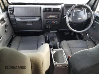 2006 Jeep Wrangler Sport Right Hand Drive with VIN 1J4F449S16P741407, listed as a Copart auction lot 88804015 with 182,059 mi miles and Salvage Title. Bid and sale history available at carsss.com. Image 8.
