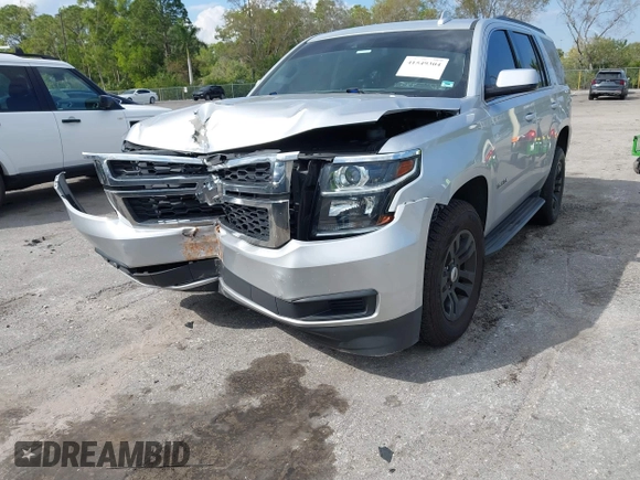 2018 Chevrolet Tahoe LT with VIN 1GNSCBKCXJR367852, listed as a IAAI auction lot 41549304 with 151,684 mi miles and . Bid and sale history available at DreamBid. Image 6.