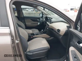 2020 Hyundai Santa Fe SEL z VIN 5NMS3CAD2LH164373, wystawiony jako IAAI lot #42099713 z przebiegiem 49 566 mil mil oraz . Historia ofert i sprzedaży dostępna na DreamBid. Obrazek 5.