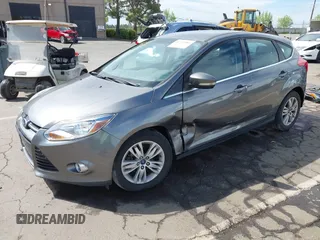 2012 Ford Focus SEL with VIN 1FAHP3M29CL314685, listed as a IAAI auction lot 41974881 with 167,119 mi miles. Bid and sale history available at carsss.com. Image 2.