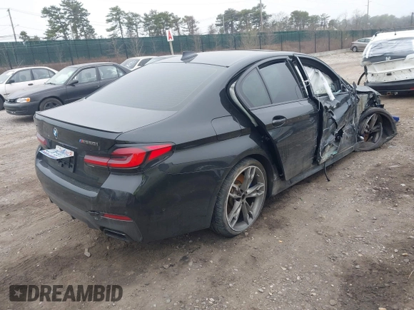 2022 BMW 5 Series M550i xDrive z VIN WBA13BK01NCH76521, wystawiony jako IAAI lot #41904437 z przebiegiem Nie podano mil oraz . Historia ofert i sprzedaży dostępna na DreamBid. Obrazek 4.