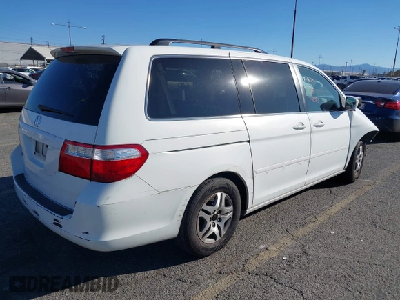 2006 Honda Odyssey EX z VIN 5FNRL38486B410286, wystawiony jako IAAI lot #41641433 z przebiegiem 145 312 mil mil oraz . Historia ofert i sprzedaży dostępna na DreamBid. Obrazek 4.