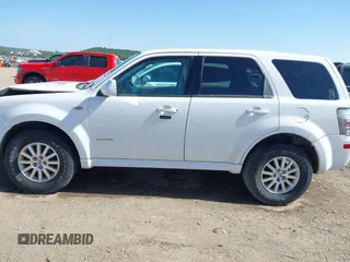 2008 Mercury Mariner Premier z VIN 4M2CU97188KJ53286, wystawiony jako IAAI lot #42269669 z przebiegiem 292 027 mil mil oraz . Historia ofert i sprzedaży dostępna na DreamBid. Obrazek 14.