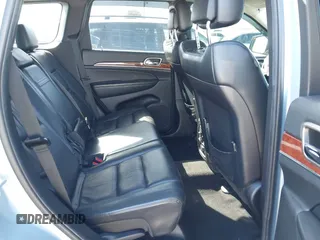 2012 Jeep Grand Cherokee Limited z VIN 1C4RJFBTXCC341813, wystawiony jako IAAI lot #41791662 z przebiegiem 120 811 mil mil oraz . Historia ofert i sprzedaży dostępna na DreamBid. Obrazek 8.
