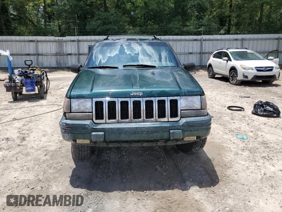 1998 Jeep Grand Cherokee Laredo with VIN 1J4GZ48S5WC289251, listed as a Copart auction lot 63594685 with 156,358 mi miles and Salvage title. Bid and sale history available at DreamBid. Image 5.