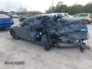 2022 Mazda 3 Carbon Edition z VIN JM1BPACL2N1509492, wystawiony jako IAAI lot #41198183 z przebiegiem Nie podano mil oraz . Historia ofert i sprzedaży dostępna na DreamBid. Obrazek 3.
