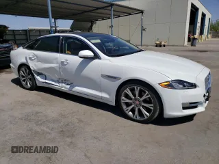 2019 Jaguar XJ Portfolio with VIN SAJWA2G72K8W21087, listed as a Copart auction lot 66017344 with 22,671 mi miles and Salvage Title. Bid and sale history available at DreamBid. Image 4.