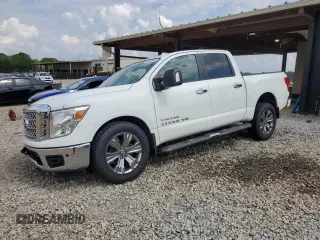 2018 Nissan Titan SV with VIN 1N6AA1E63JN501888, listed as a Copart auction lot 57502645 with 100,967 mi miles and Salvage title. Bid and sale history available at DreamBid. Image 1.