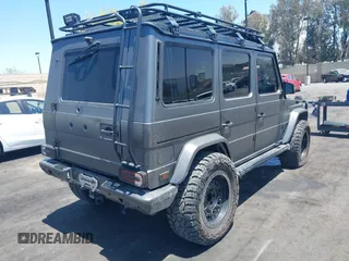2014 Mercedes-Benz G 63 AMG with VIN WDCYC7DF7EX220956, listed as a IAAI auction lot 42272984 with 129,893 mi miles and . Bid and sale history available at DreamBid. Image 4.