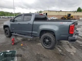 2015 Chevrolet Colorado 4WD Z71 with VIN 1GCGTCE35F1272962, listed as a Copart auction lot 55525325 with 129,701 mi miles and Salvage title. Bid and sale history available at DreamBid. Image 2.