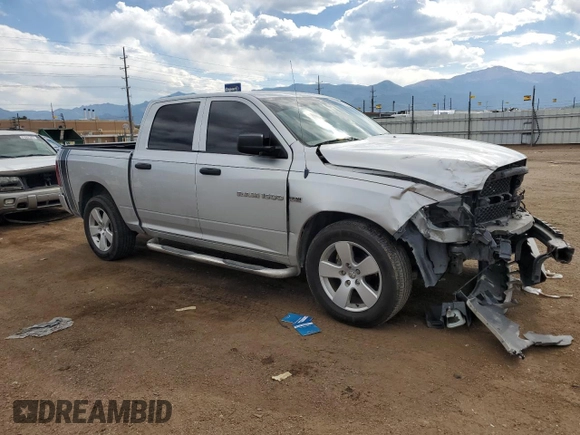 2012 Ram 1500 Express with VIN 1C6RD7KT1CS142370, listed as a Copart auction lot 60756925 with 106,627 mi miles and Salvage title. Bid and sale history available at DreamBid. Image 4.