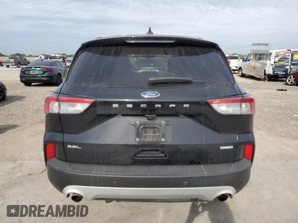 2020 Ford Escape SEL with VIN 1FMCU0H64LUB19432, listed as a Copart auction lot 50333285 with 77,135 mi miles and Salvage title. Bid and sale history available at DreamBid. Image 6.