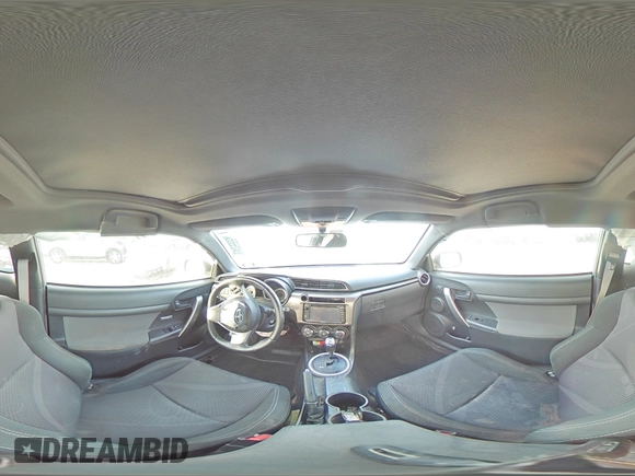 2014 Scion tC z VIN JTKJF5C79E3067932, wystawiony jako Copart lot #50425555 z przebiegiem Nie podano mil oraz Szkody całkowita. Historia ofert i sprzedaży dostępna na DreamBid. Obrazek 13.