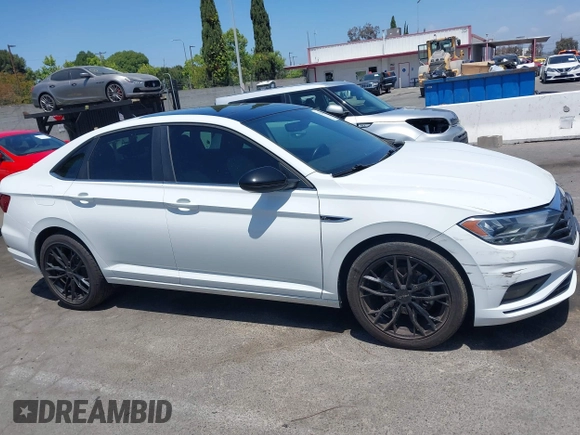 2020 Volkswagen Jetta S z VIN 3VWC57BU5LM080448, wystawiony jako IAAI lot #42267311 z przebiegiem 64 301 mil mil oraz . Historia ofert i sprzedaży dostępna na DreamBid. Obrazek 13.