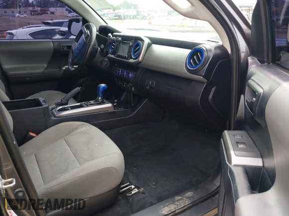 2018 Toyota Tacoma SR5 with VIN 5TFAZ5CNXJX066952, listed as a IAAI auction lot 41894562 with 141,818 mi miles and . Bid and sale history available at DreamBid. Image 5.
