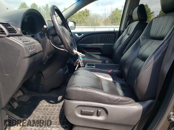 2007 Honda Odyssey Touring with VIN 5FNRL38847B022928, listed as a Copart auction lot 53869135 with 217,620 mi miles and Salvage Title. Bid and sale history available at DreamBid. Image 7.