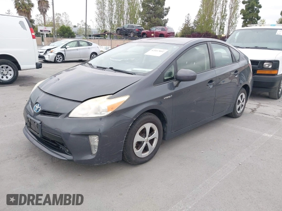 2013 Toyota Prius One with VIN JTDKN3DU6D5599875, listed as a IAAI auction lot 42057892 with 118,216 mi miles. Bid and sale history available at carsss.com. Image 2.